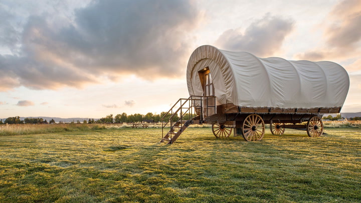 Experience 25 U.S. States in a Modern Oregon Trail Covered Wagon